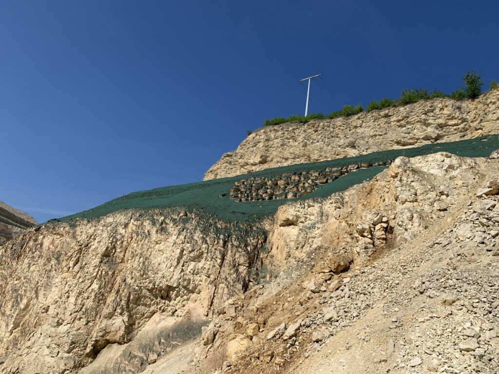 Hydraulically applied erosion control on a graded slope