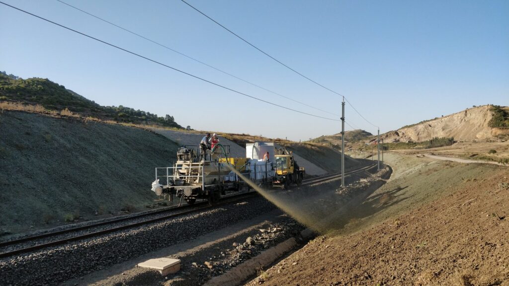 Railway track revegetation by hydroseeding